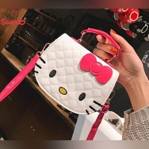 🩷🆕 Hello Kitty Crossbody Bag in white and pink.